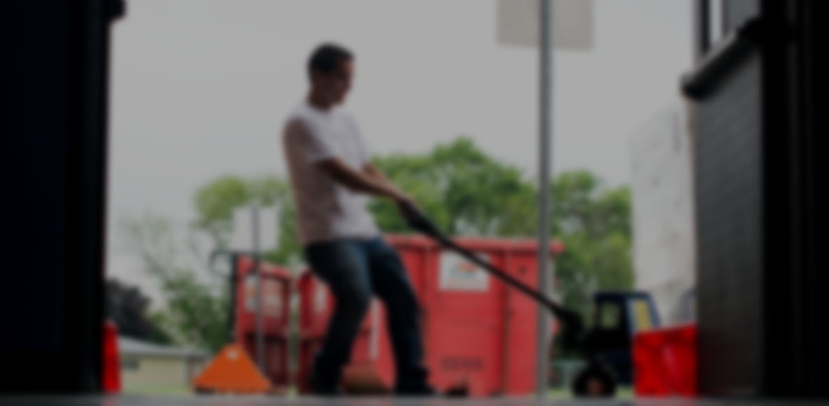 Grounds worker working at school