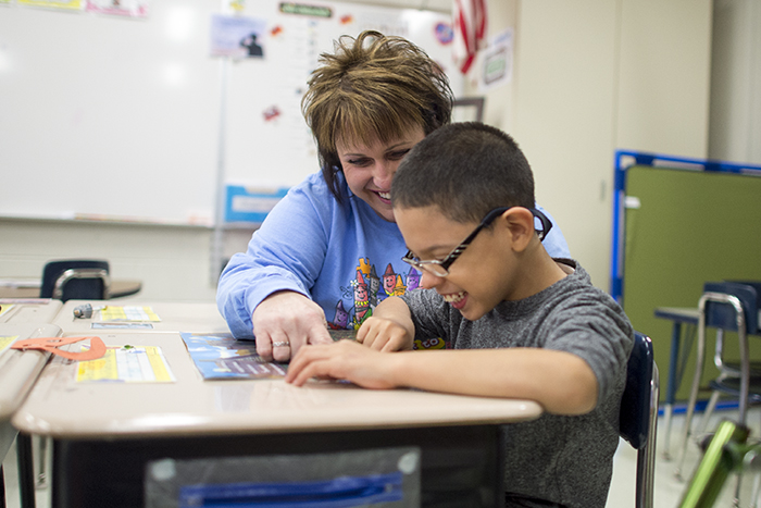 Student and Teacher reading