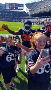 Students Taking Selfies with Bears Player at Soldier Field