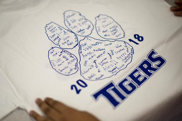 Back of T-shirt designed with paw print