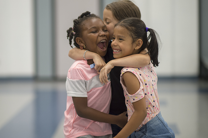 1Girls Hugging
