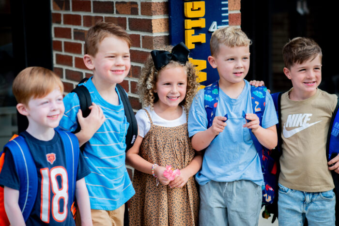 Students standing together on the first day of school.